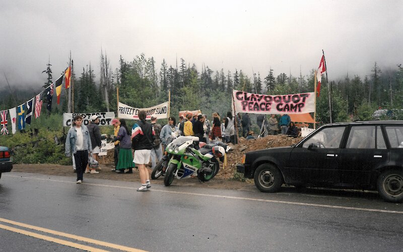 Activist camp with a Clayoquot Peace Camp sign