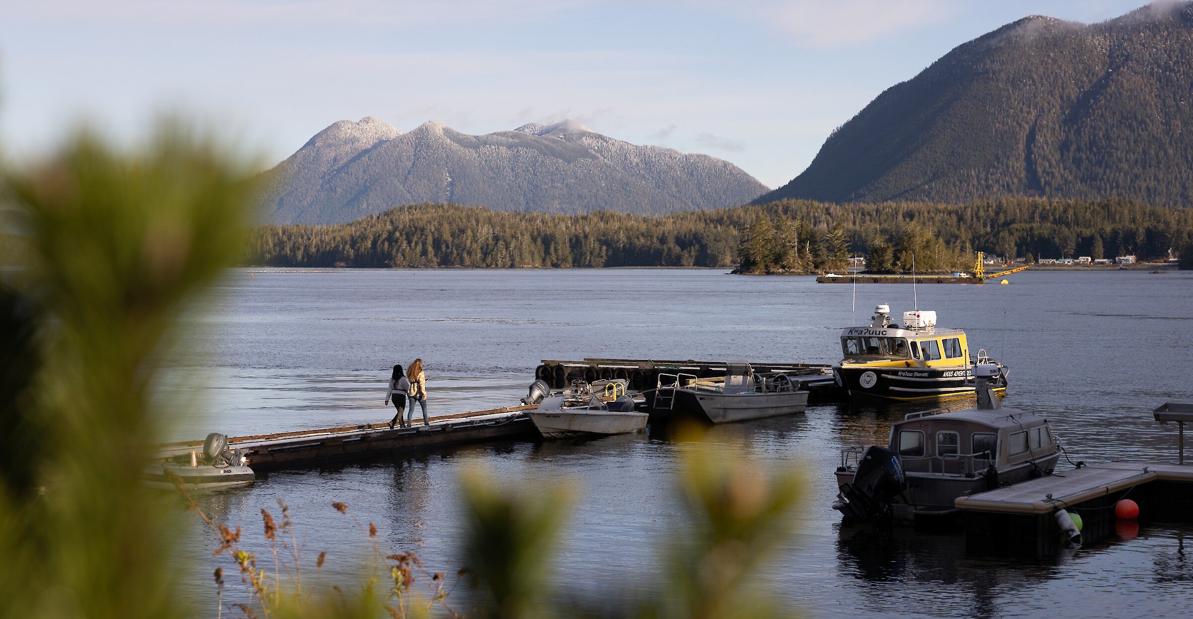 Walking along the dock toward the water taxi in the Tofino Marina.