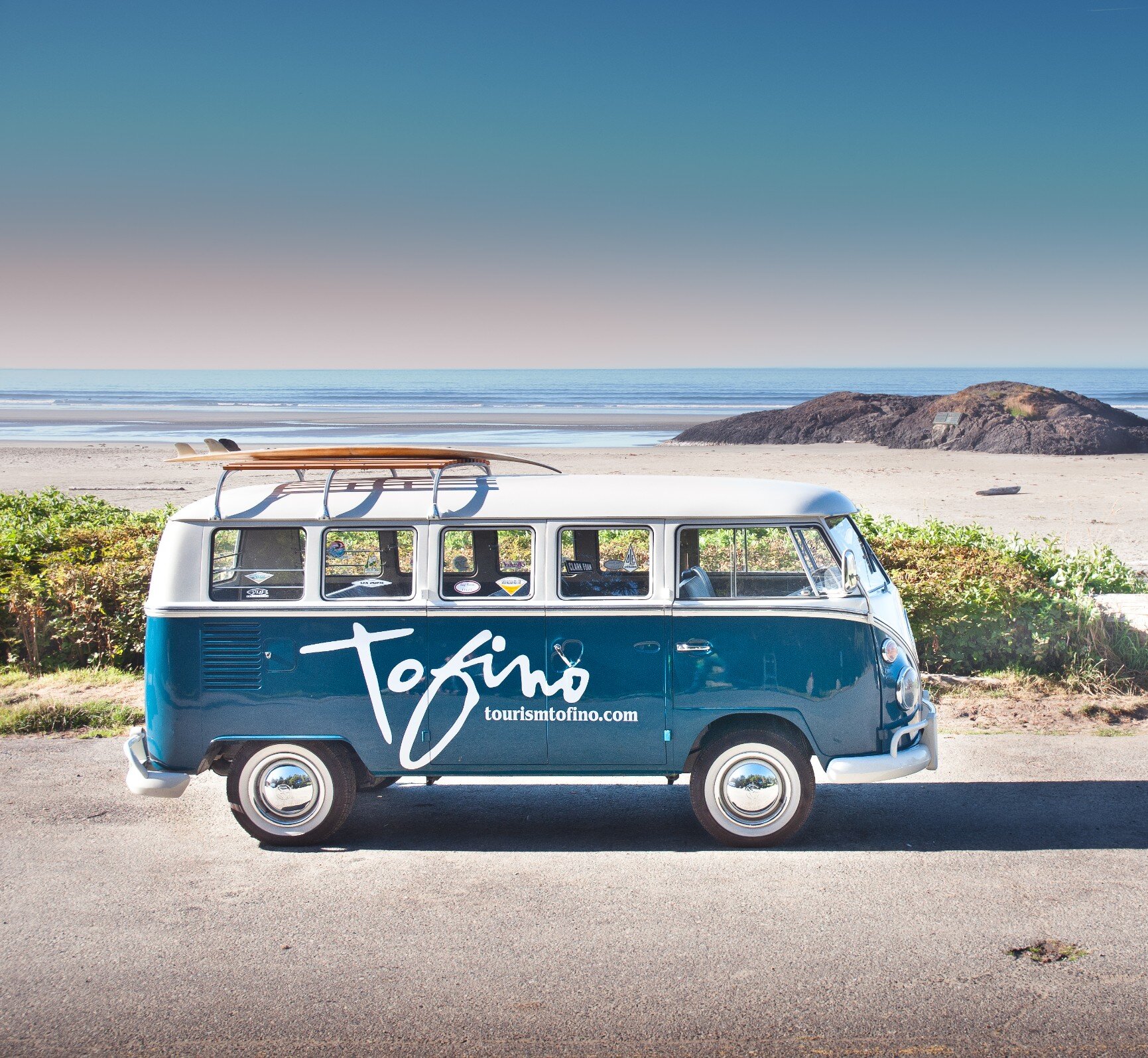 Tourism Tofino's VW van parked by the beach