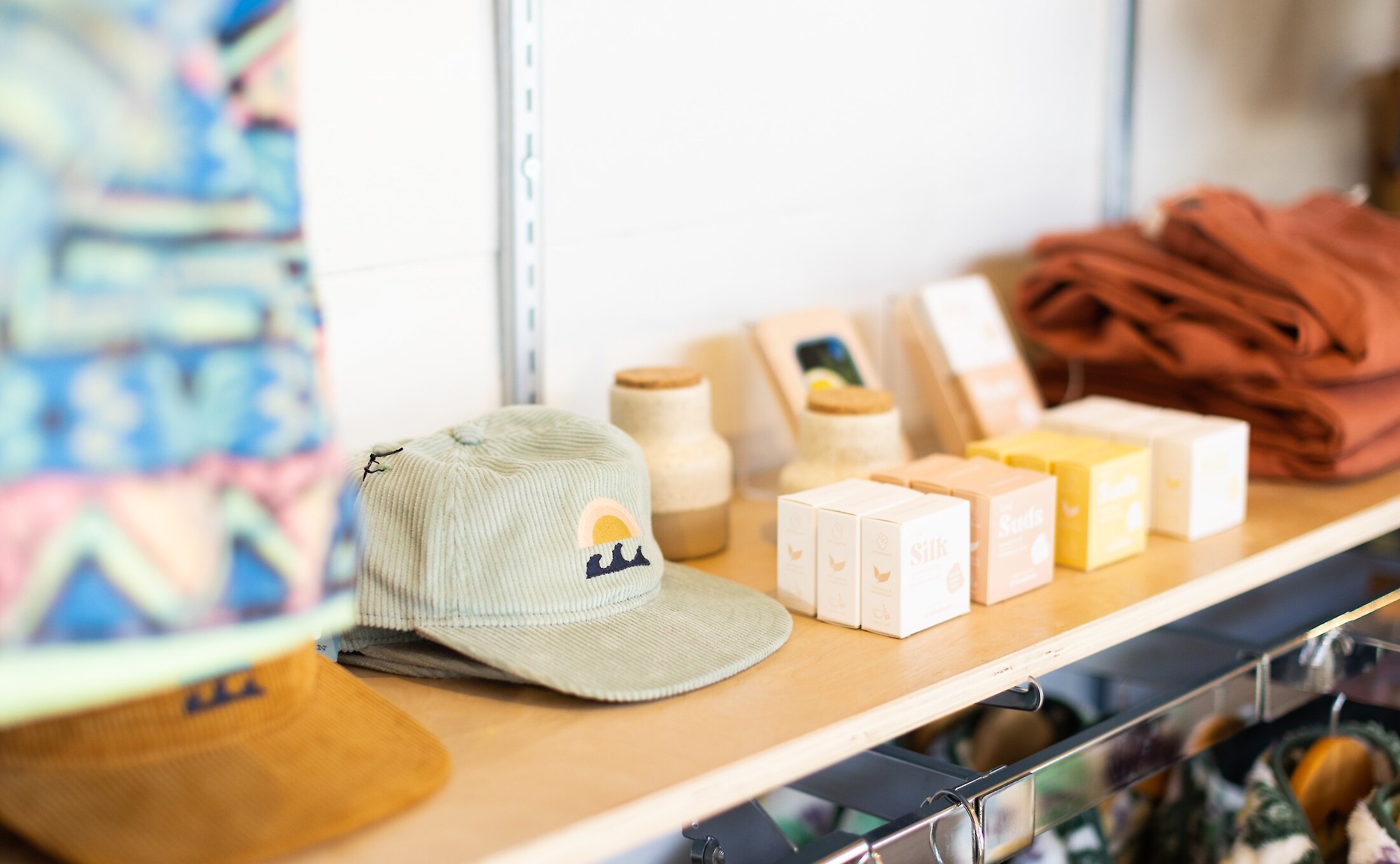 Local giftware and clothing displayed in a store