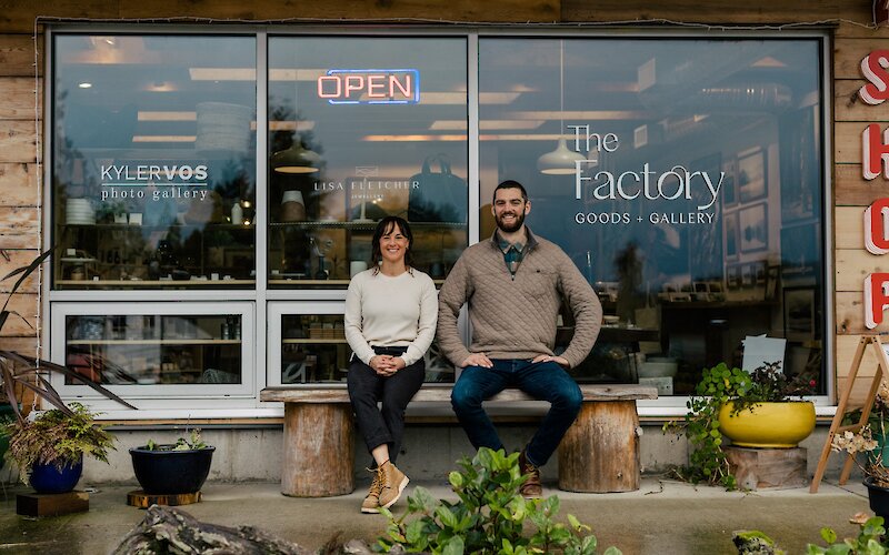 Lisa Fletcher and Kyler Vos sit in front of The Factory in Tofino.