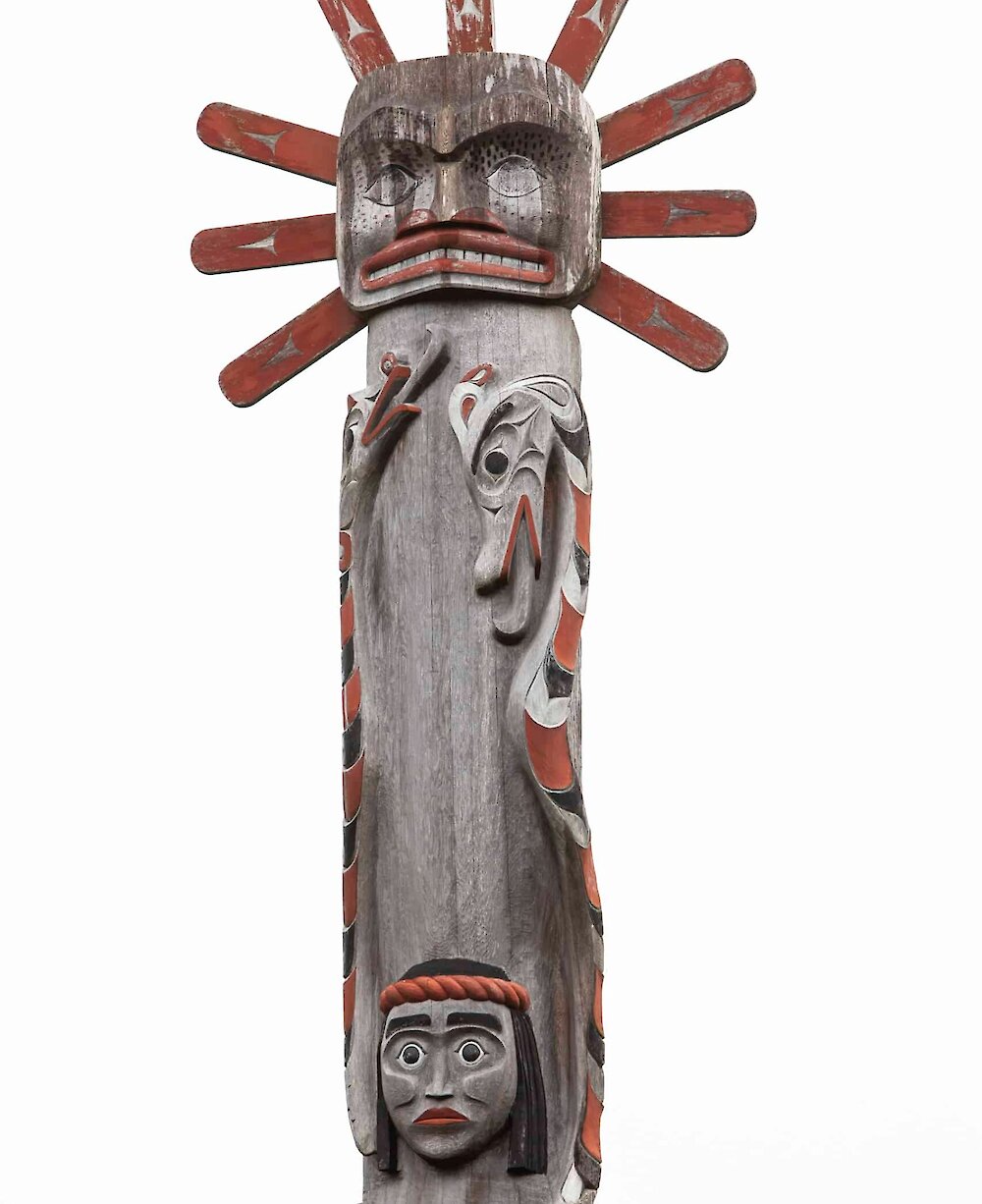 Totem pole with sun crest