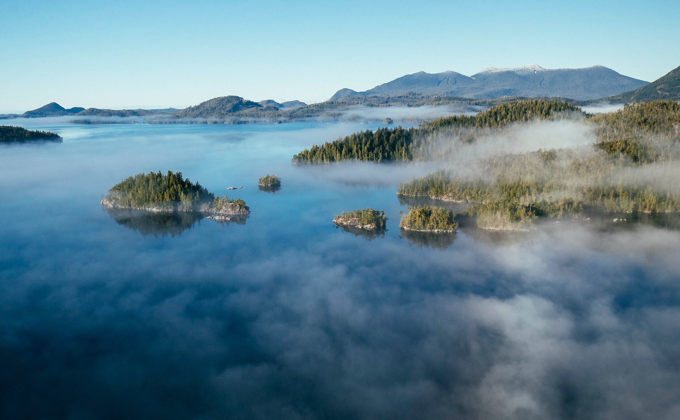 View from the sky of small islands amidst the clouds