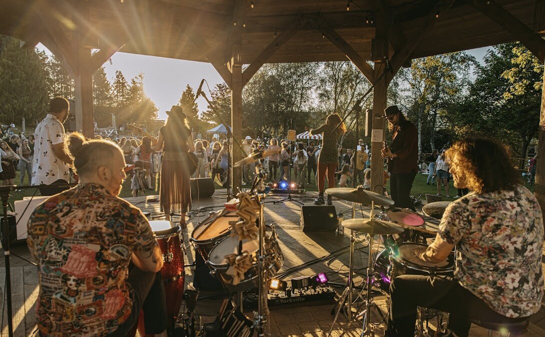 Band playing in the outdoor gazebo in the summer