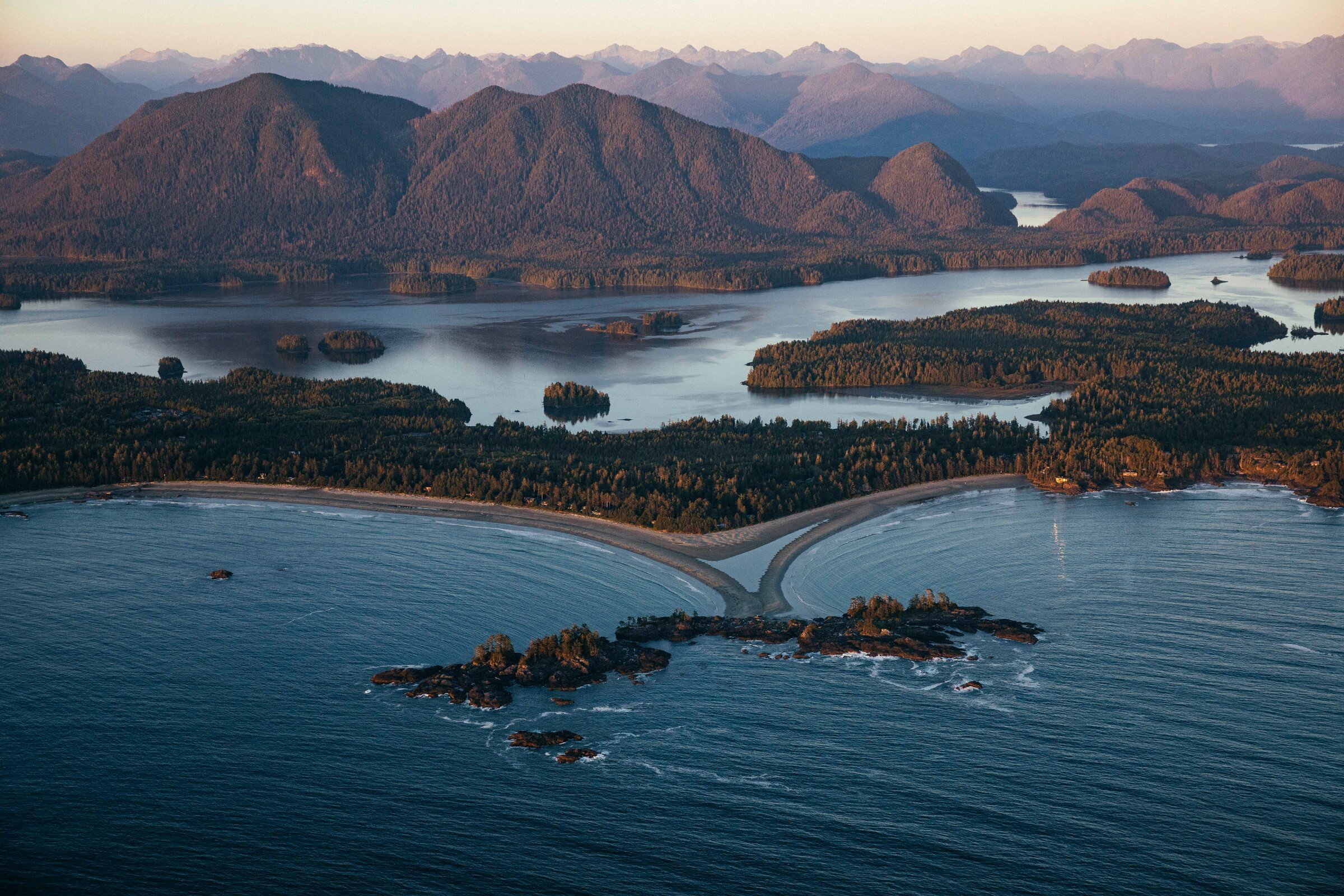 Aerial view of Clayoquot Sound's islands, ocean and mountains in the background
