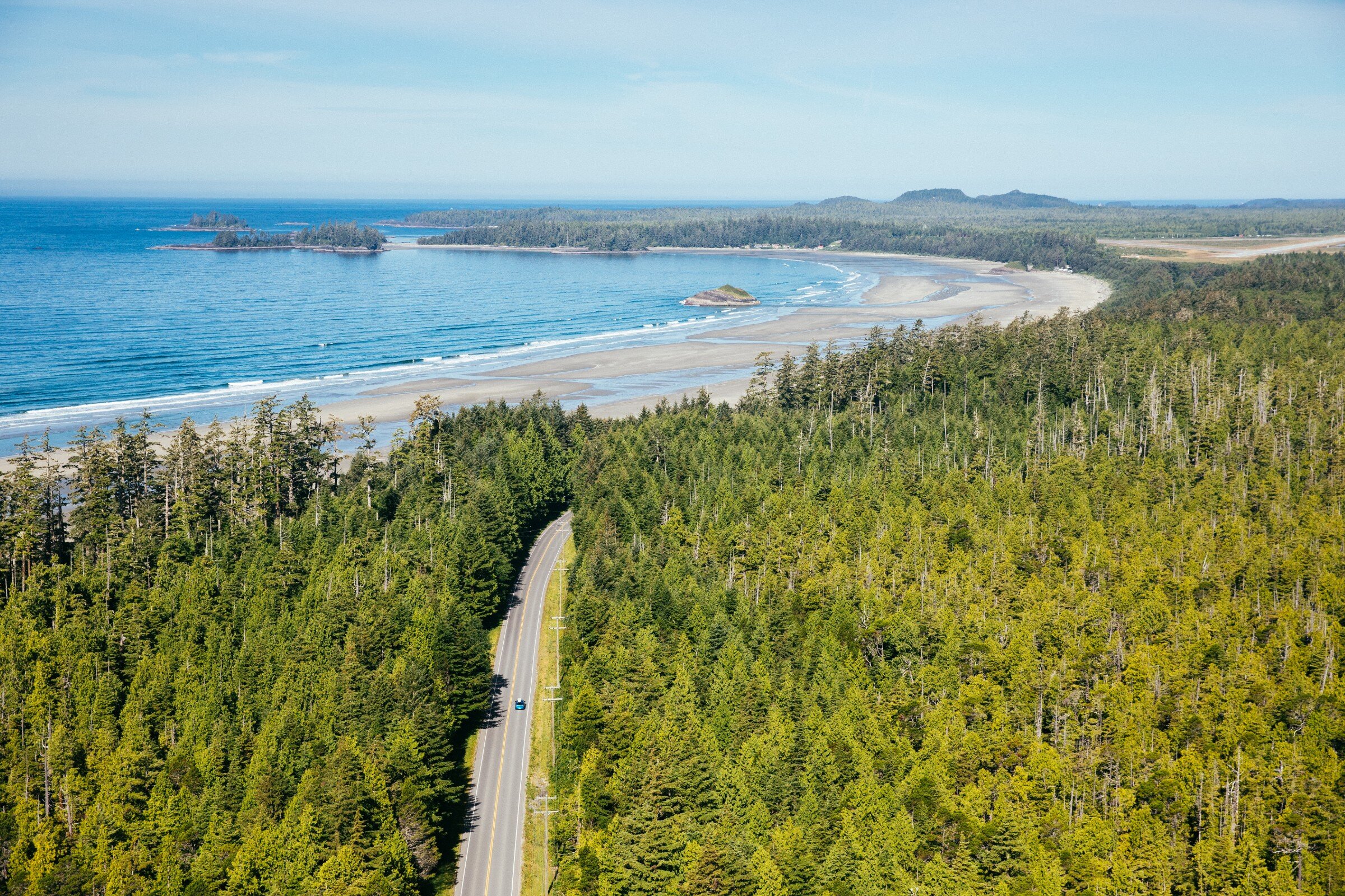 Winding highway in the forest leading to the beach and ocean