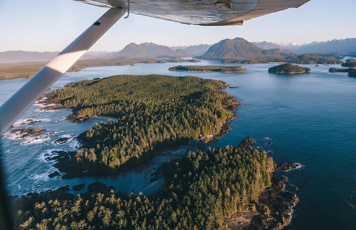 View from a floatplane looking at islands and ocean below