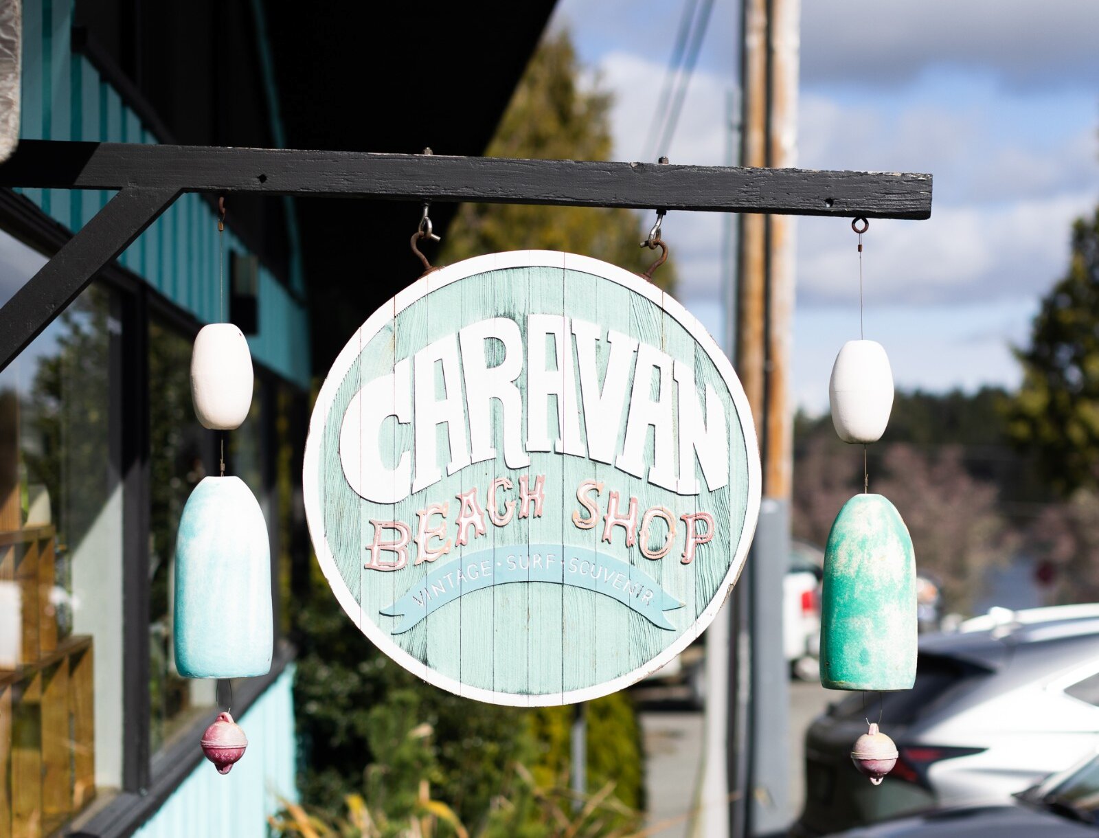 round exterior shop sign