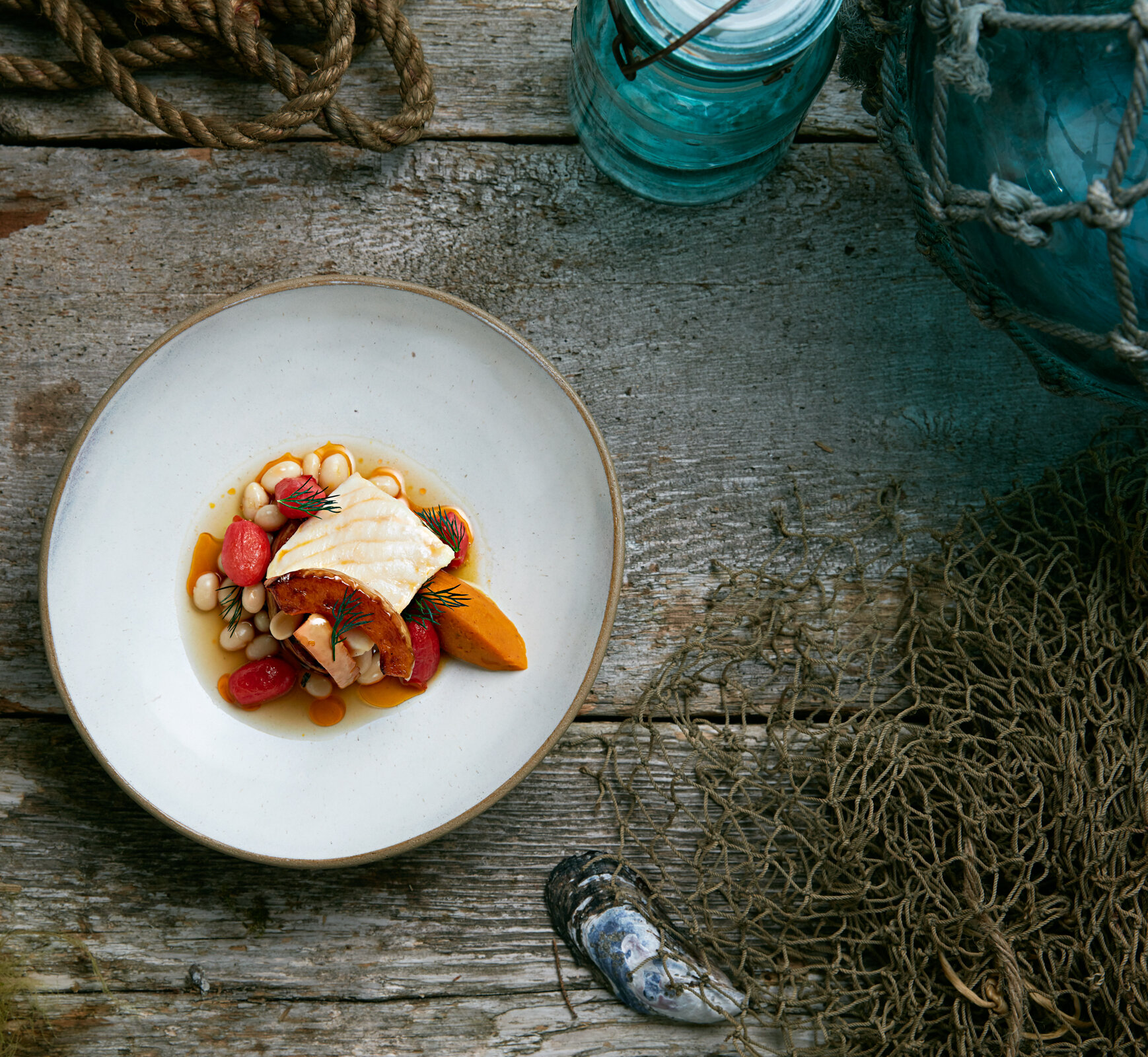 Sturgeon on a plate on a wooden table