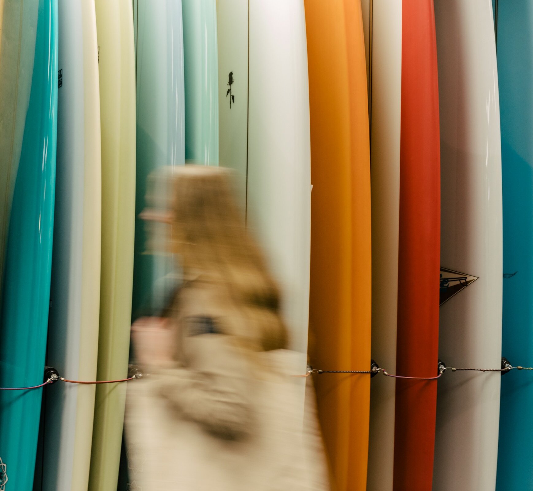 Rack of surf boards in a surf shop